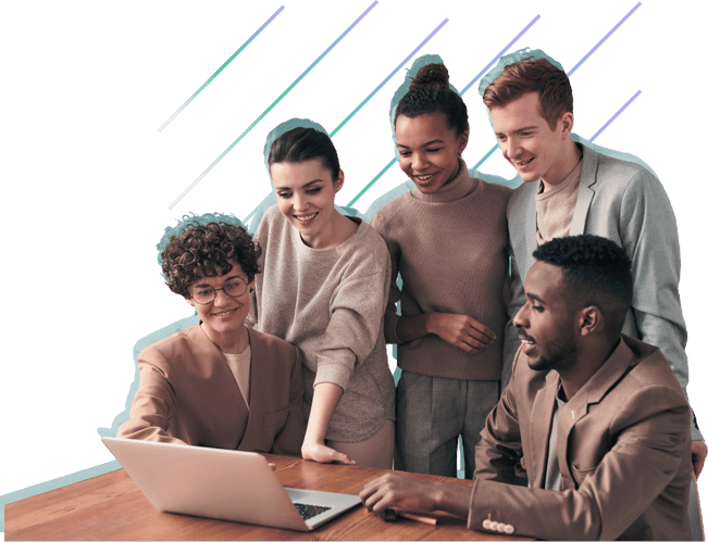 A group of people standing around a desk looking at a laptop